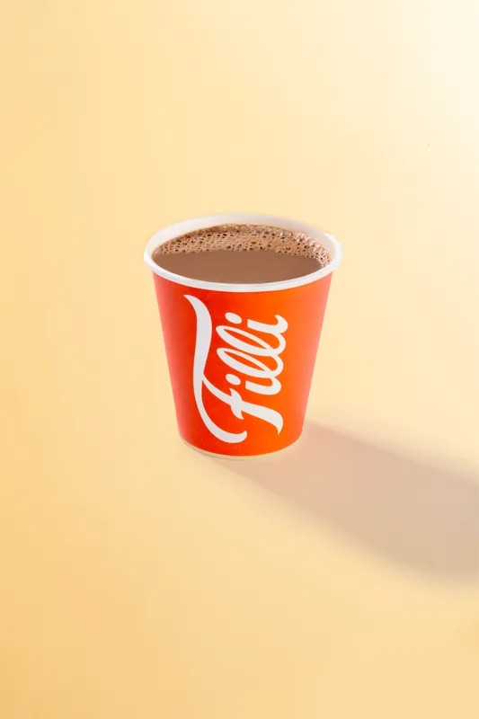 Orange FiLLi cup filled with hot chocolate