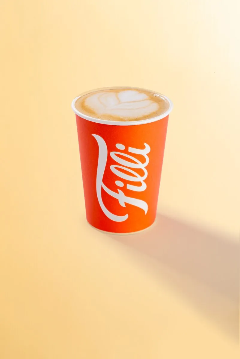 Orange FiLLi cup filled with honey lavender cappuccino