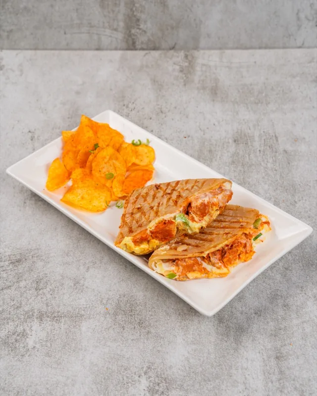 Toasted Achari Chicken Tikka Melt with fries