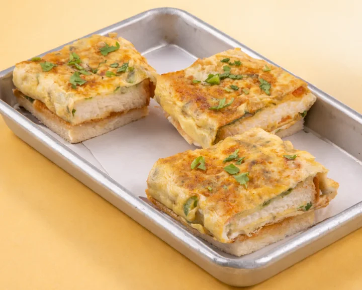 Desi bread topped with masala omelette