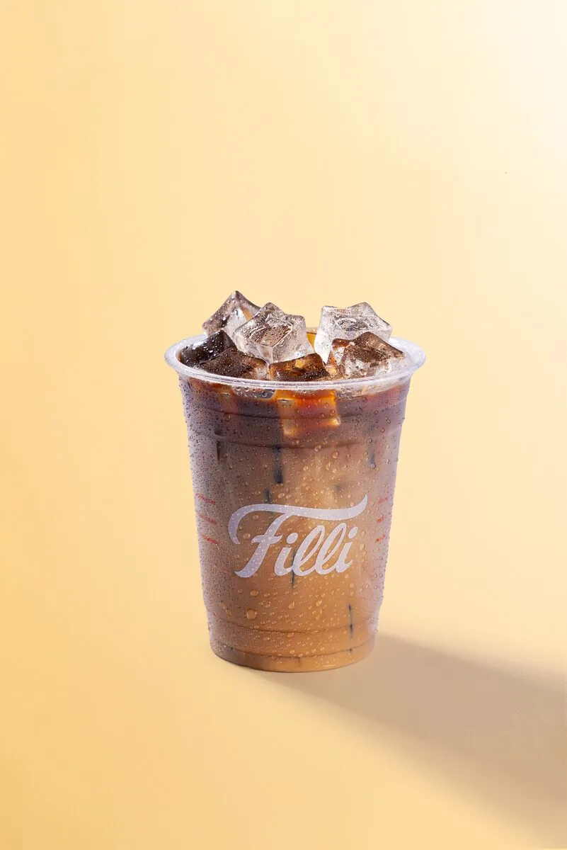 Clear FiLLi cup of black Americano coffee over ice