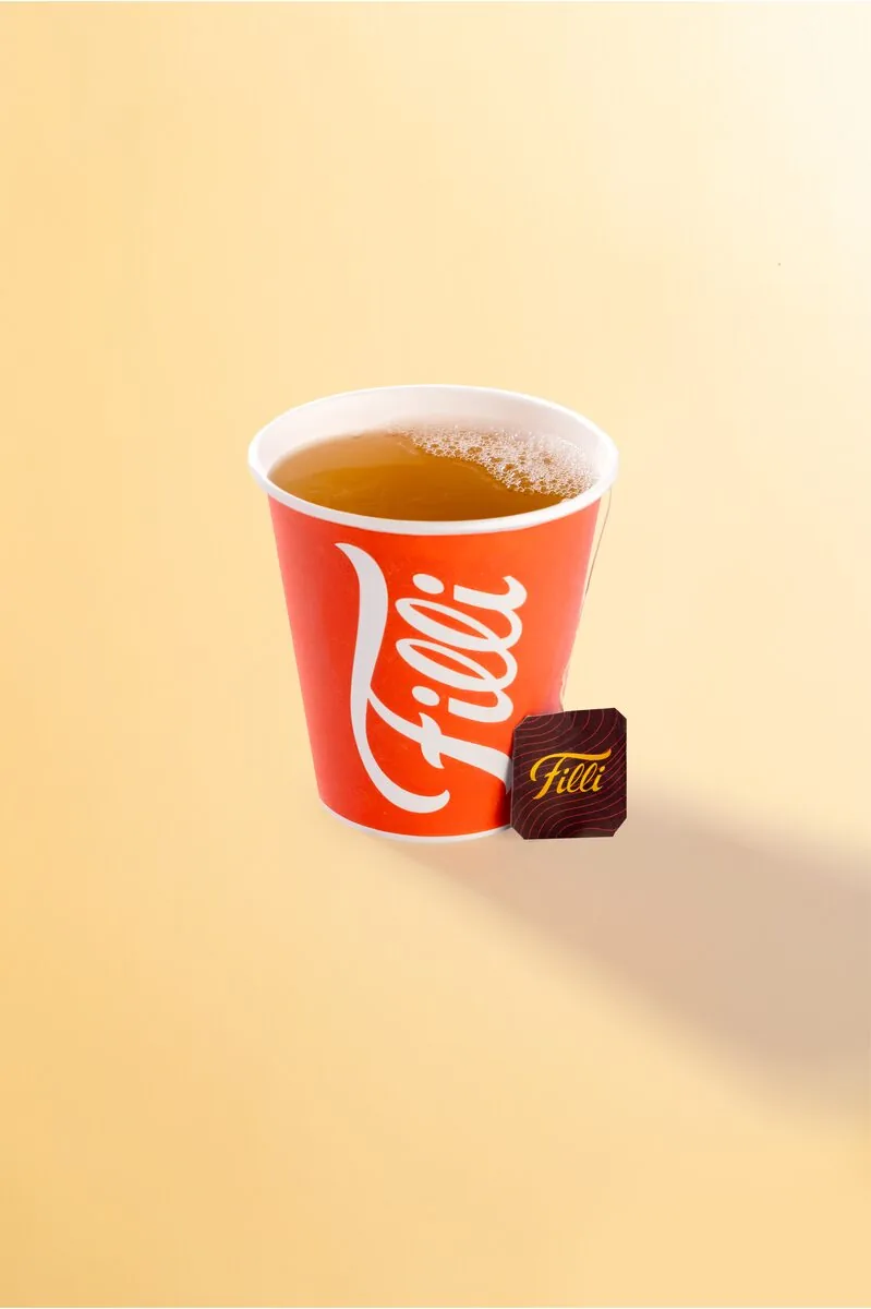 Orange FiLLi cup filled with honey ginger tea