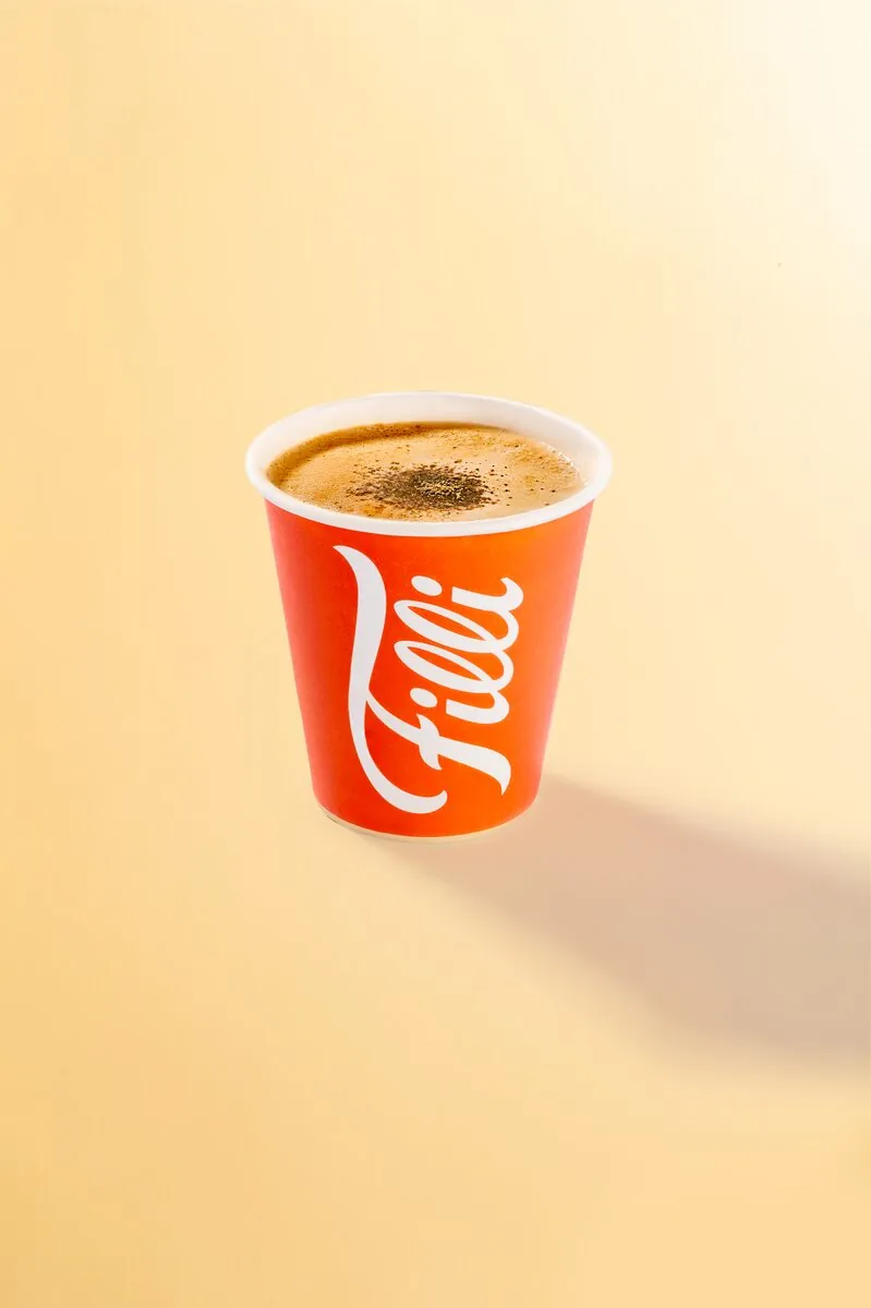 Orange FiLLi cup filled with Masala Chai