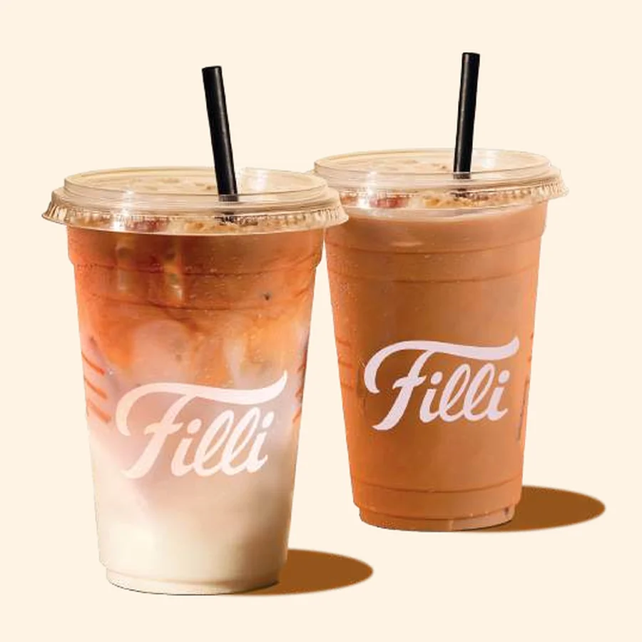 Two clear FiLLi Cafe iced coffee cups with straws, from the printed FiLLi iced coffee menu page